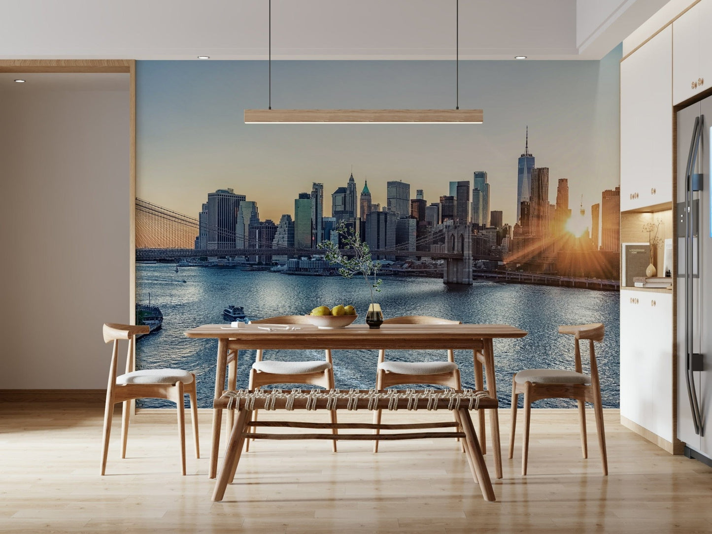 NYC Skyline at Dawn wallpaper mural of the dawn skyline behind a wood dining table and bench in a bright kitchen