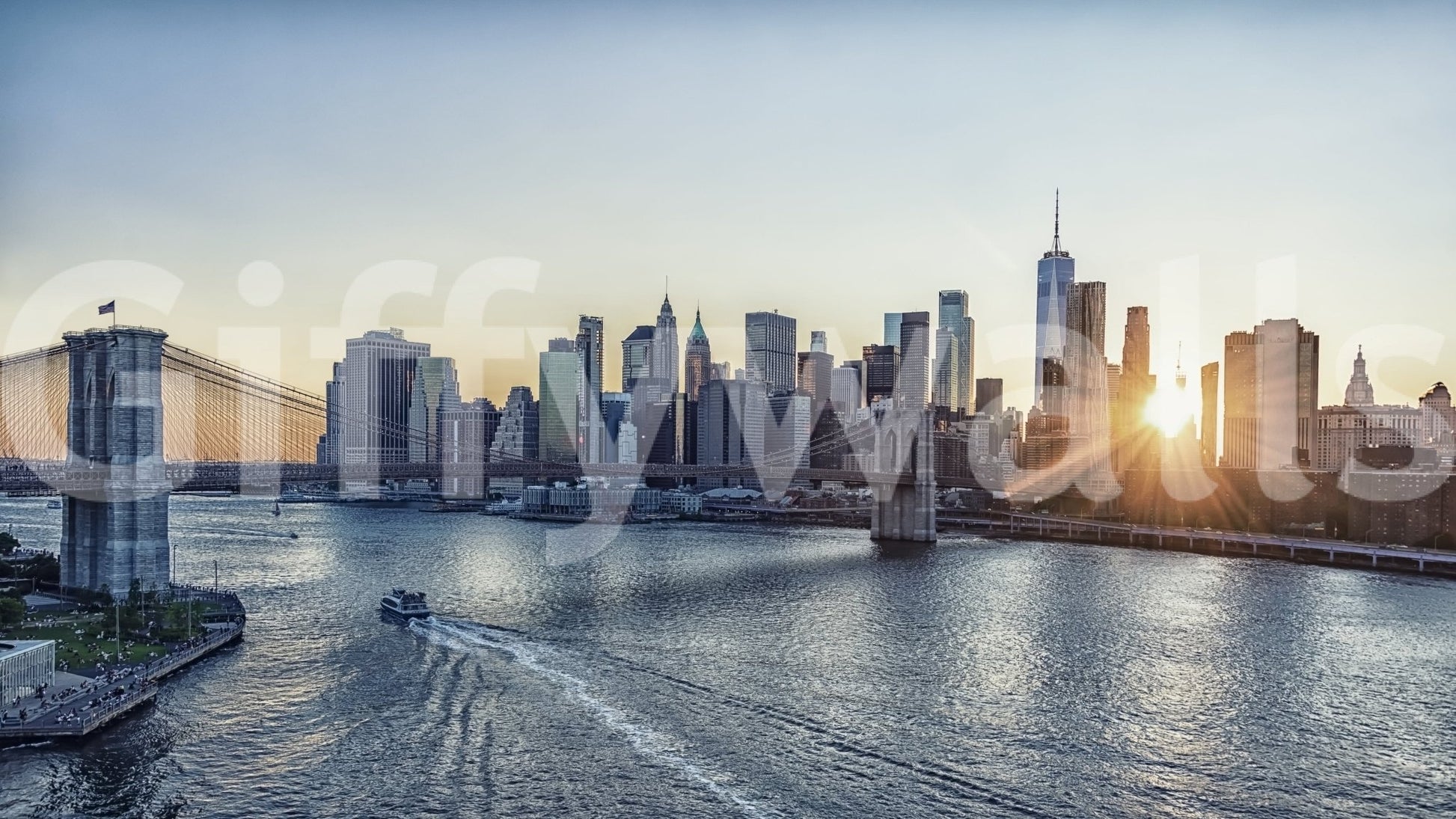 NYC Skyline at Dawn wallpaper mural shown as a full-wall view of Manhattan and the Brooklyn Bridge at golden sunrise