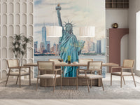 NYC's Lady Liberty wallpaper mural of the statue and NYC skyline behind a wood dining table and cane chairs in a dining room