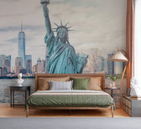NYC's Lady Liberty wallpaper mural with the Statue of Liberty and skyline behind a wood bed with green bedding in a bedroom