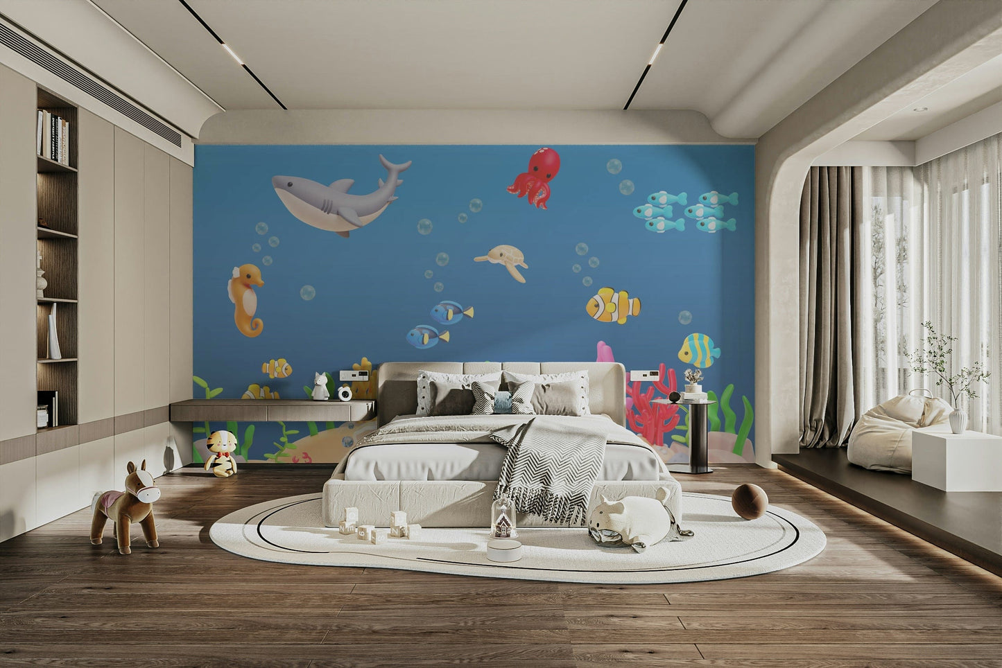 The design features a group of friendly cartoon sea animals and coral.

