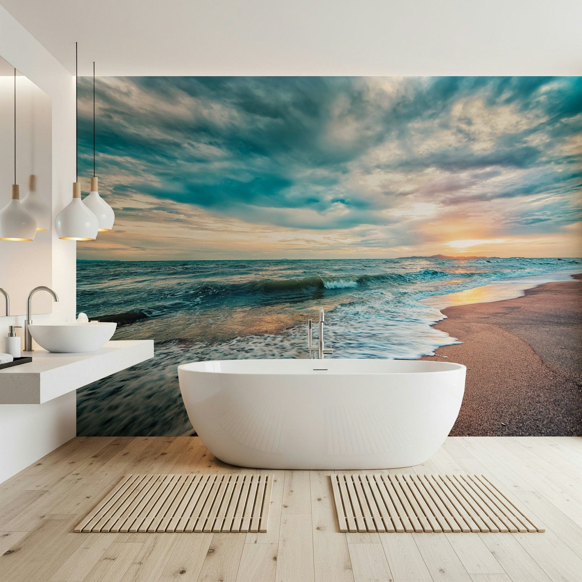 Ocean Hues wallpaper mural with turquoise sea and sunset sky behind a freestanding white tub in a bright bathroom