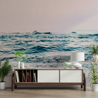 Tranquil ocean wave mural in blush tones

