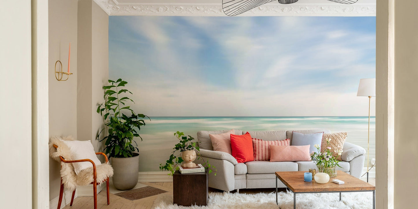 Tranquil turquoise sea with soft sky tones

