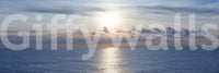 Kids teen room mural with calm ocean sunset, simple decor and soft gold hues