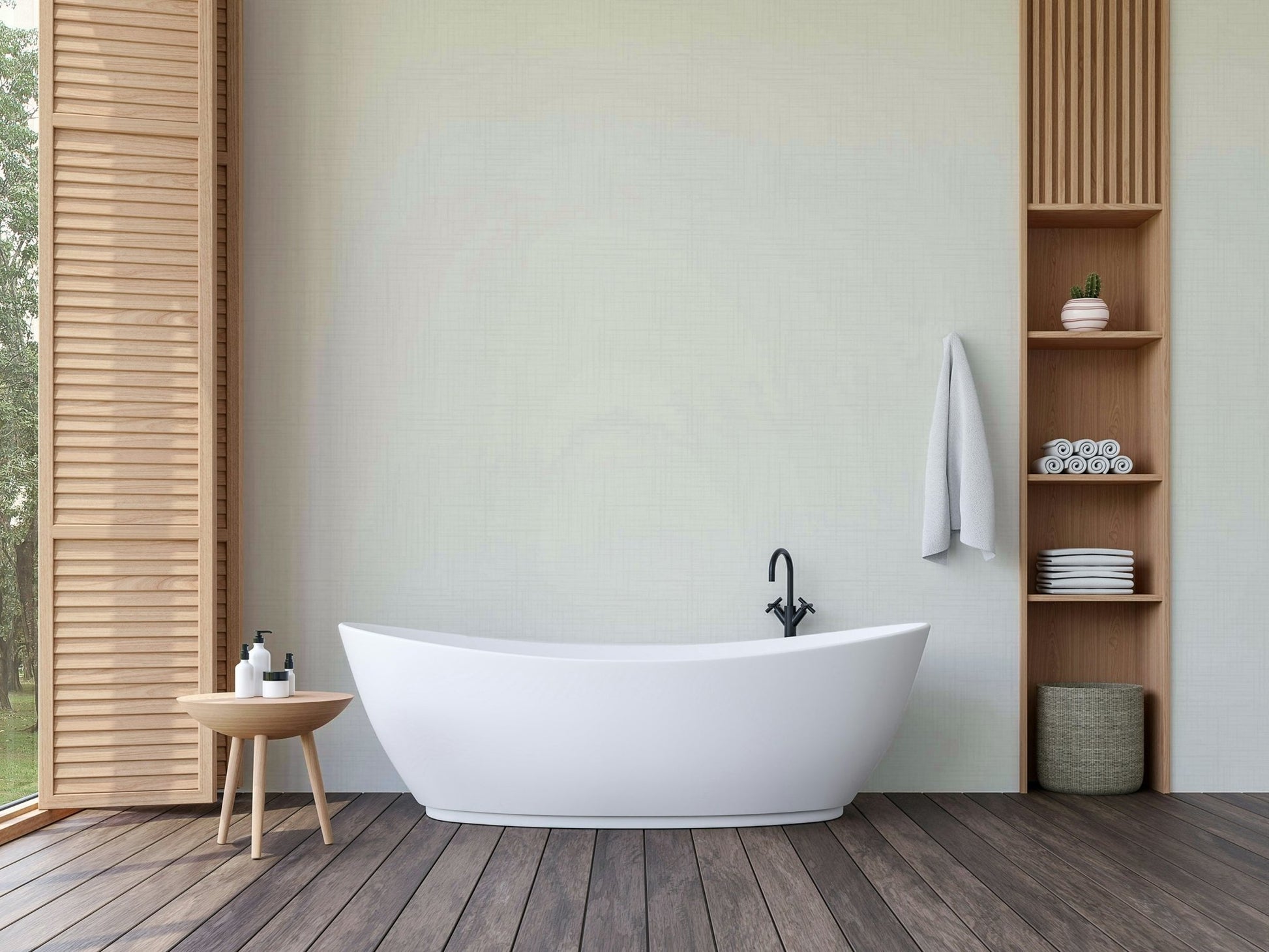 Old Canvas Cannoli Cream wallpaper in pale cream behind a white freestanding bathtub with wood slat shelving