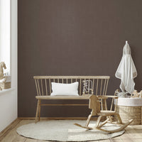 The design has a layered, artistic look with a sense of texture.

