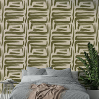 Earthy olive abstract wallpaper in a cozy living room

