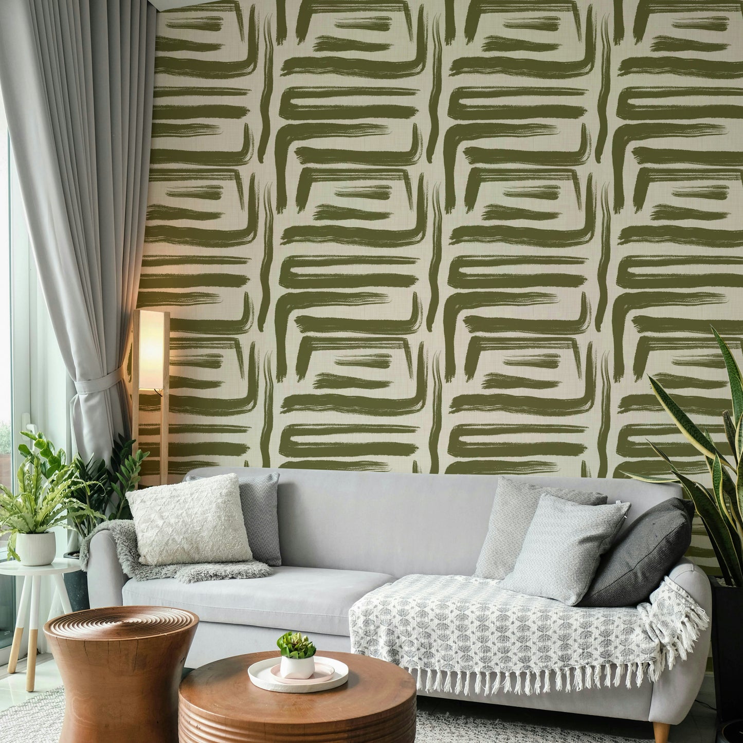 Close-up of abstract olive brushstroke wallpaper pattern

