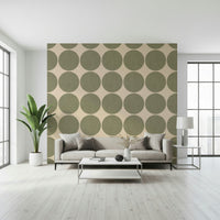 Olive circles wallpaper featuring large olive-green dots on a soft beige background