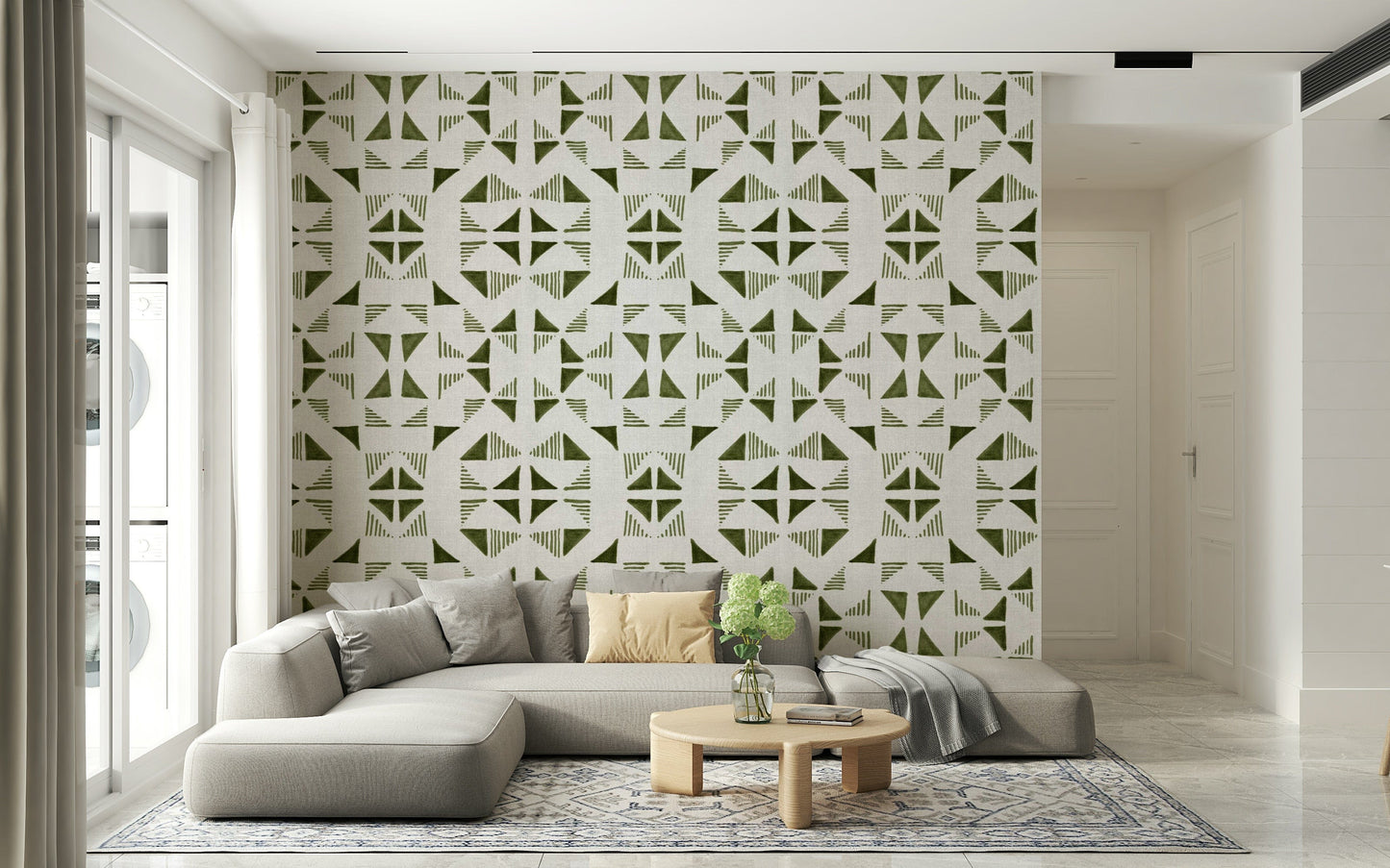 Triangles wallpaper in light olive tones creating a calm and contemporary accent wall.