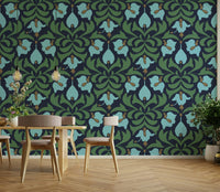 Rich, jewel-toned flowers and foliage are visible.
