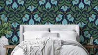 A dark and dramatic floral wallpaper pattern.
