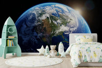 Boys Bedroom  with celestial wall mural and dramatic Earth view