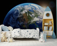 Children’s room with Earth from space wall mural and dawn glow