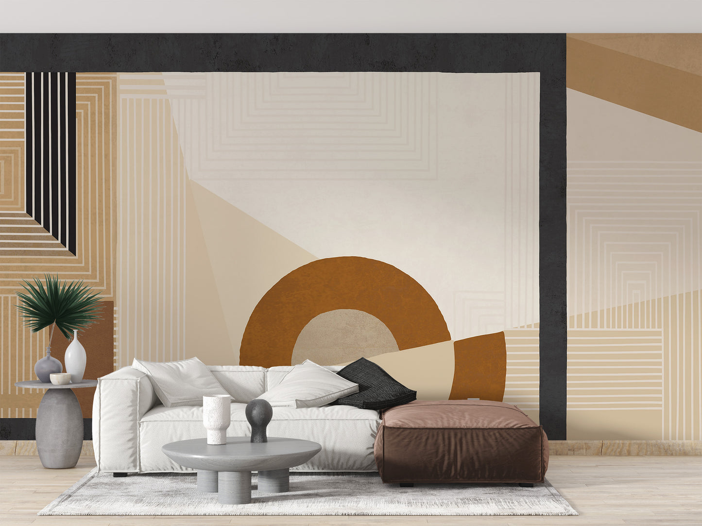 Geometric Modern Art wallpaper mural in beige and rust behind a white sofa and brown leather ottoman