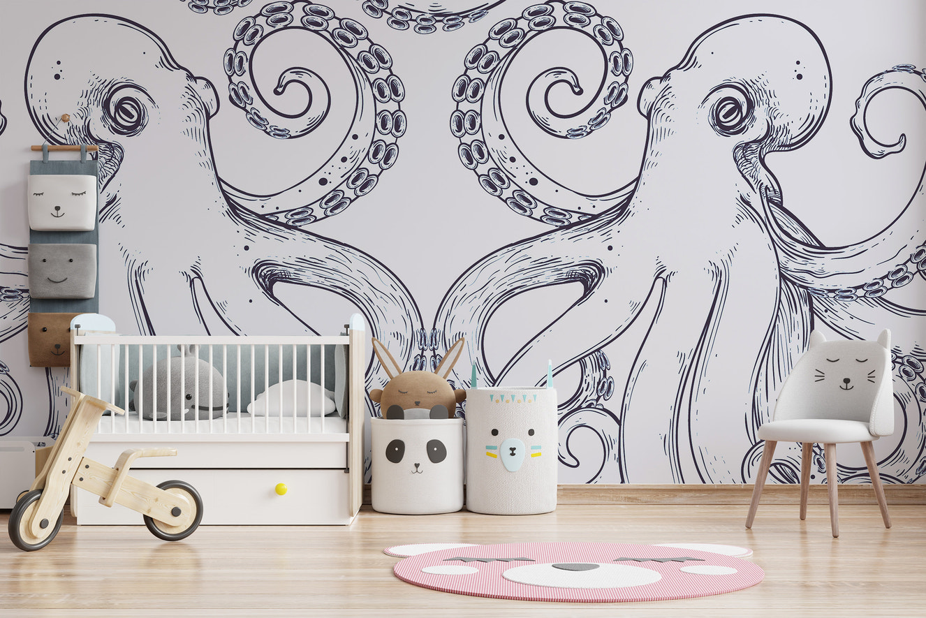Peel and stick Giant Octopus Wall Mural in a nursery with a white crib and pink bear rug.