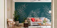 Green tropical leaves wall mural for a tranquil ambiance.
