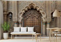 Ornate Entryway wallpaper mural of an arched wooden door behind a white cushioned bench and wood dining chairs