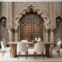 Ornate Entryway wallpaper mural with a carved doorway above a wood dining table, cream chairs and brass lamps