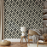 Black and white chessboard wallpaper with giant pieces

