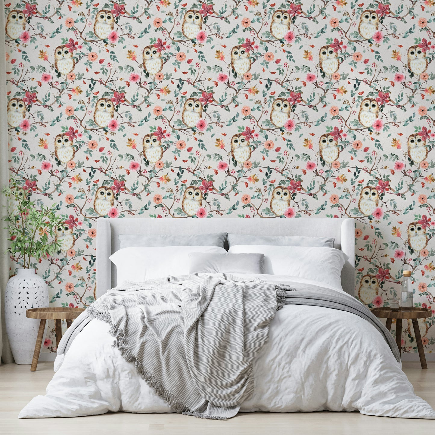 Owl nestled in tree branches on green and red wallpaper

