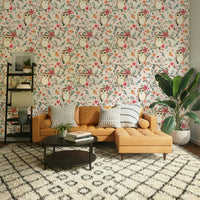 Green leafy tree with red accents and resting owl wallpaper

