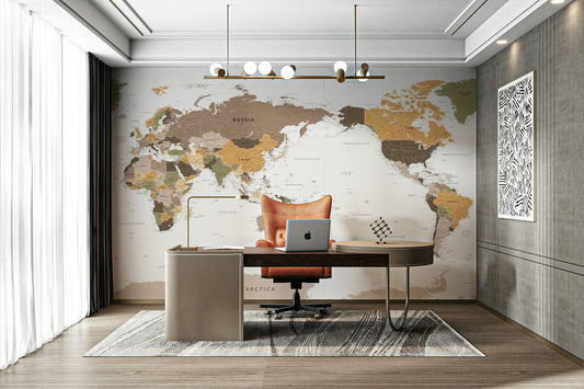 Pacific Centered Travel Map wallpaper mural in earthy tones behind a wood desk and orange office chair