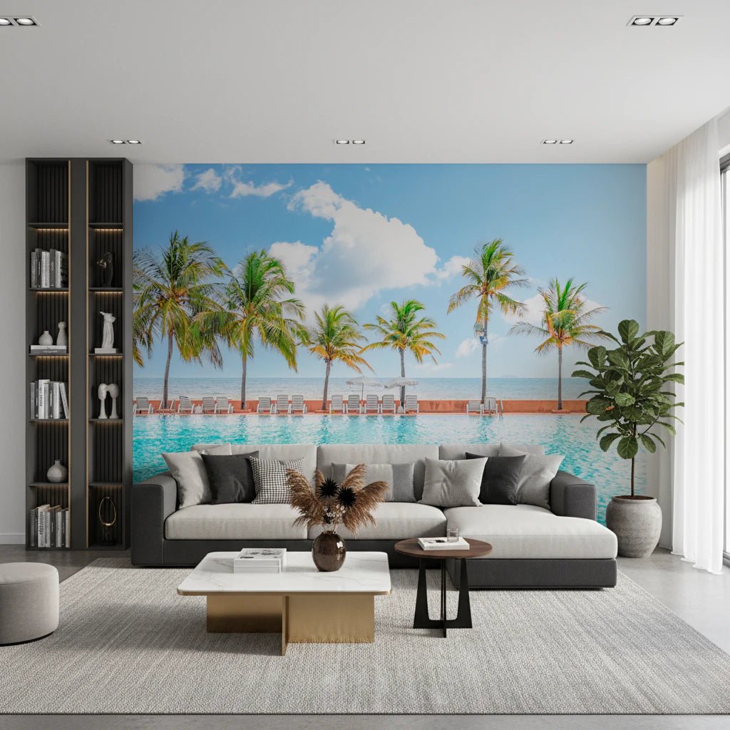 Palm Pool Escape wall mural of palm trees by a turquoise resort pool behind a grey sofa and black bookshelf