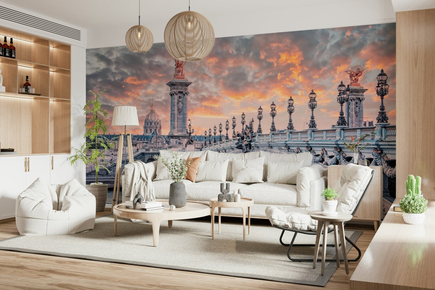 Parisian Bridge Sunset wallpaper mural showing the Paris bridge and fiery sky over a white sofa in a living room