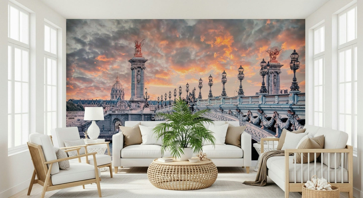 Parisian Bridge Sunset wallpaper mural of the gilded Paris bridge behind two white sofas and a rattan table