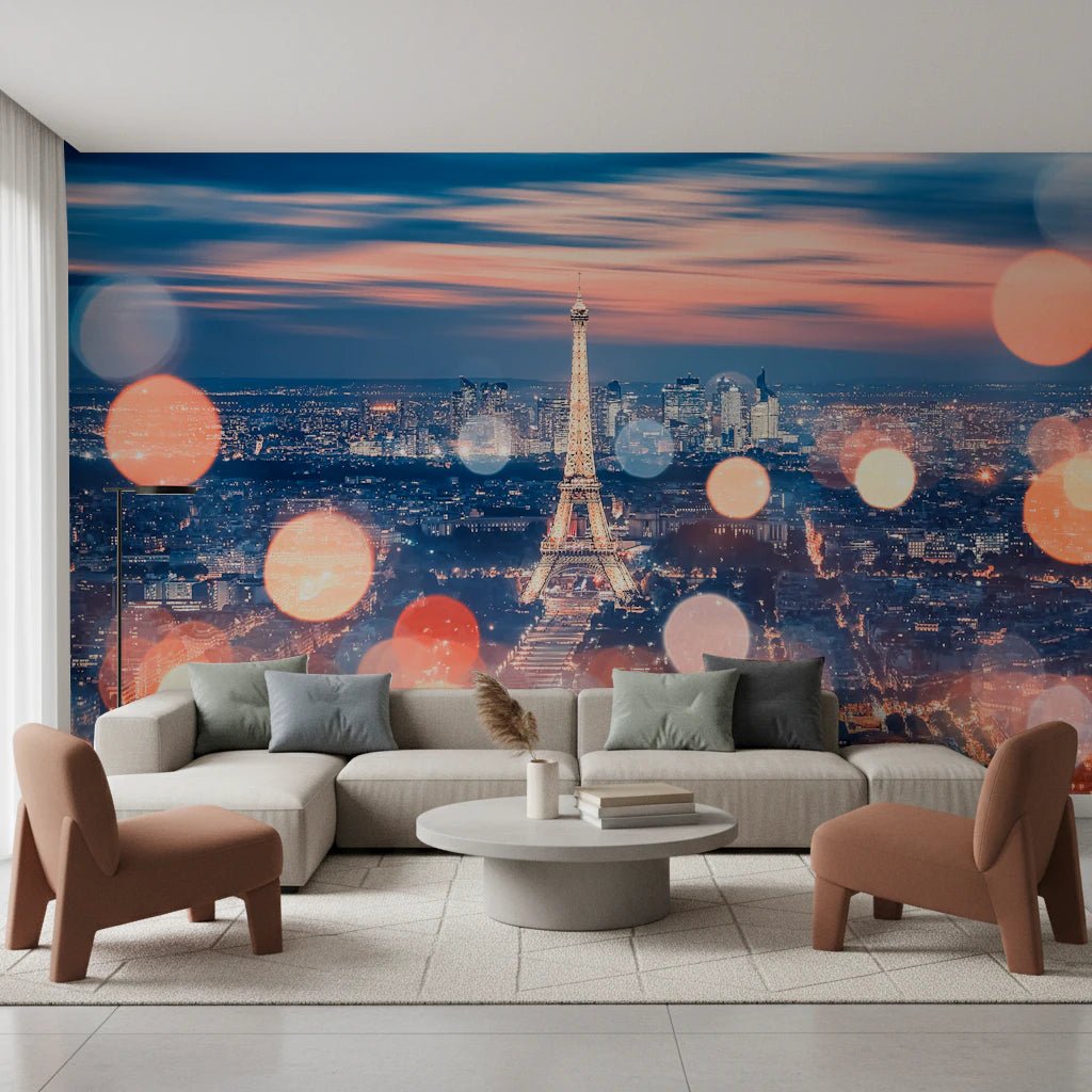 Parisian Lights wallpaper mural of the Eiffel Tower at twilight behind a grey sofa and rust armchairs in a living room