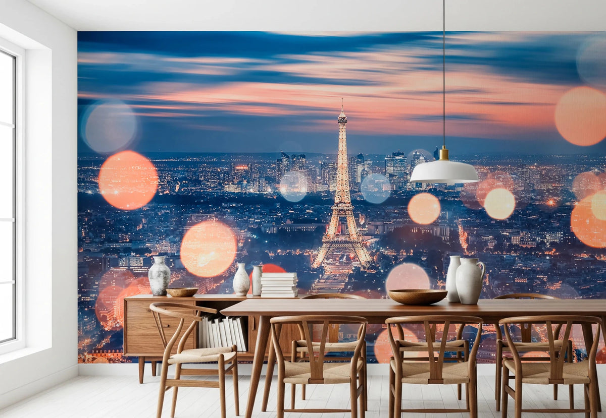 Parisian Lights wallpaper mural of the lit Eiffel Tower at dusk above a wood dining table and wishbone chairs