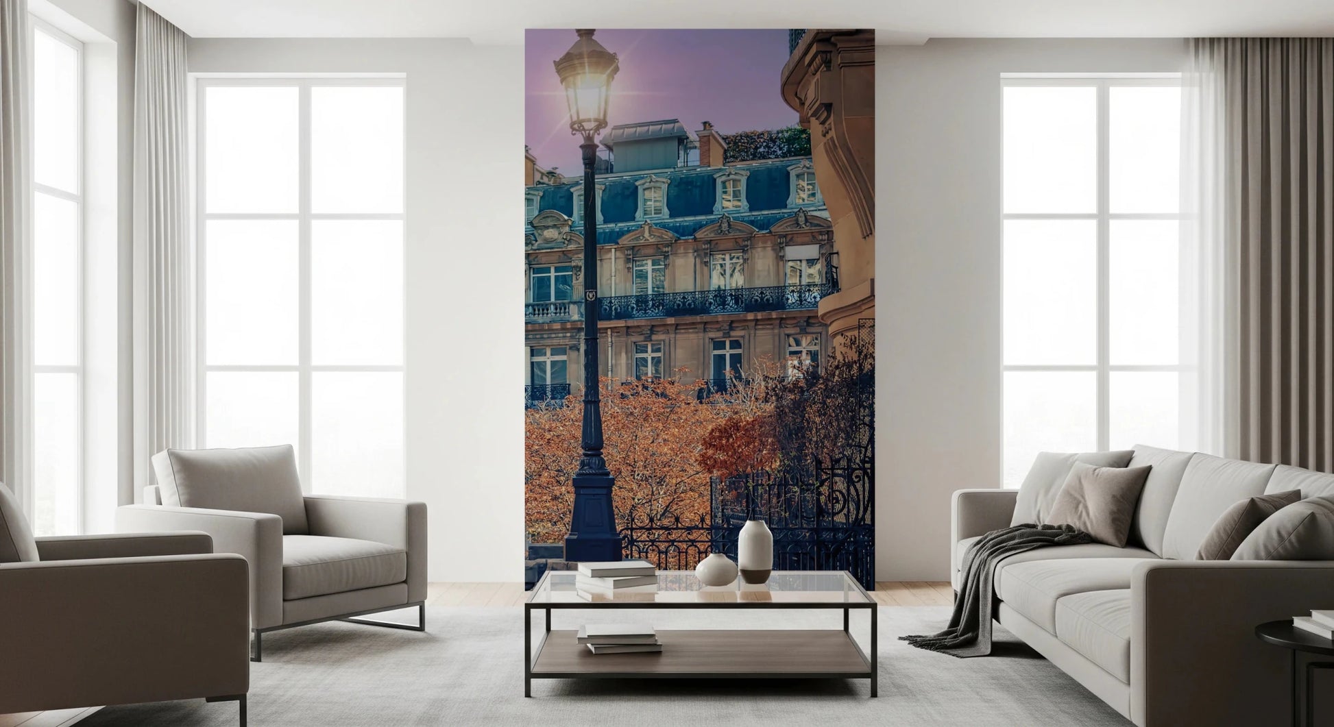 Parisian Twilight wallpaper mural of a Paris street lamp and Haussmann facade between beige armchairs in a living room