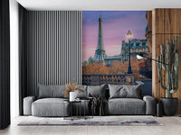 Parisian Twilight wallpaper mural of the Eiffel Tower at dusk above a grey sofa on a slatted accent wall