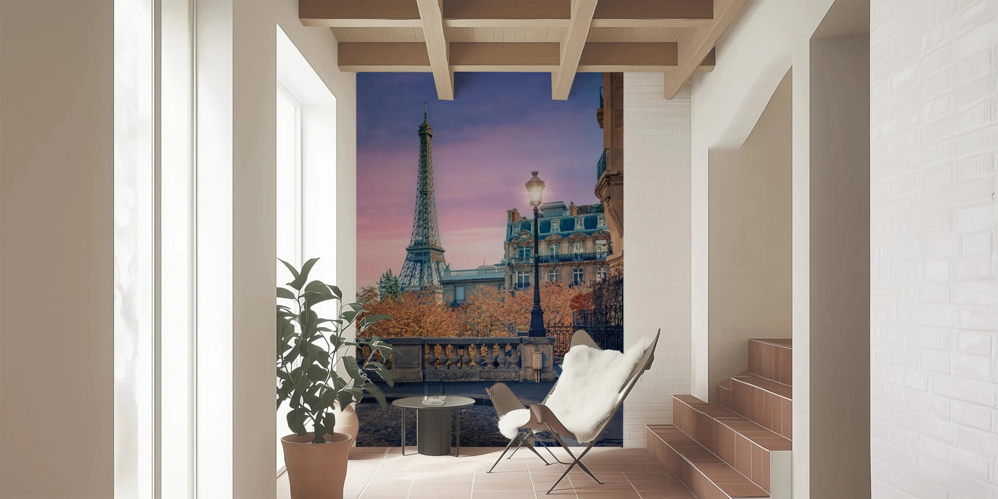 Parisian Twilight wallpaper mural with Eiffel Tower at sunset beside a white sheepskin chair in a tiled sunroom
