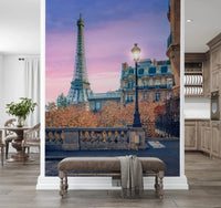 Parisian Twilight wallpaper mural with Eiffel Tower and street lamp at sunset above an upholstered entryway bench