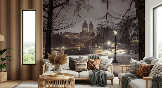 City lights skyline beyond bare trees Park Path at Night wallpaper