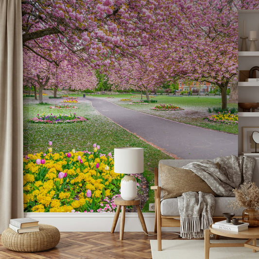 Vibrant park wallpaper with pink blossoms

