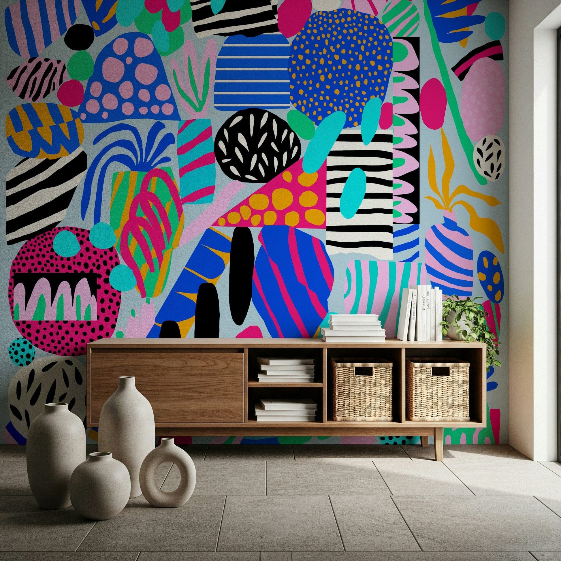 Colorful abstract shapes layered with stripes and dots create a fun, upbeat party wallpaper look.