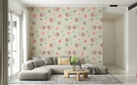 A whimsical Bird and Flower Wallpaper in soft pasteltones, showing cute birds among the blossoms.