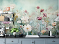 Colorful Pastel Flower wallpaper mural of watercolor blooms above blue cabinets and a white sink in a kitchen