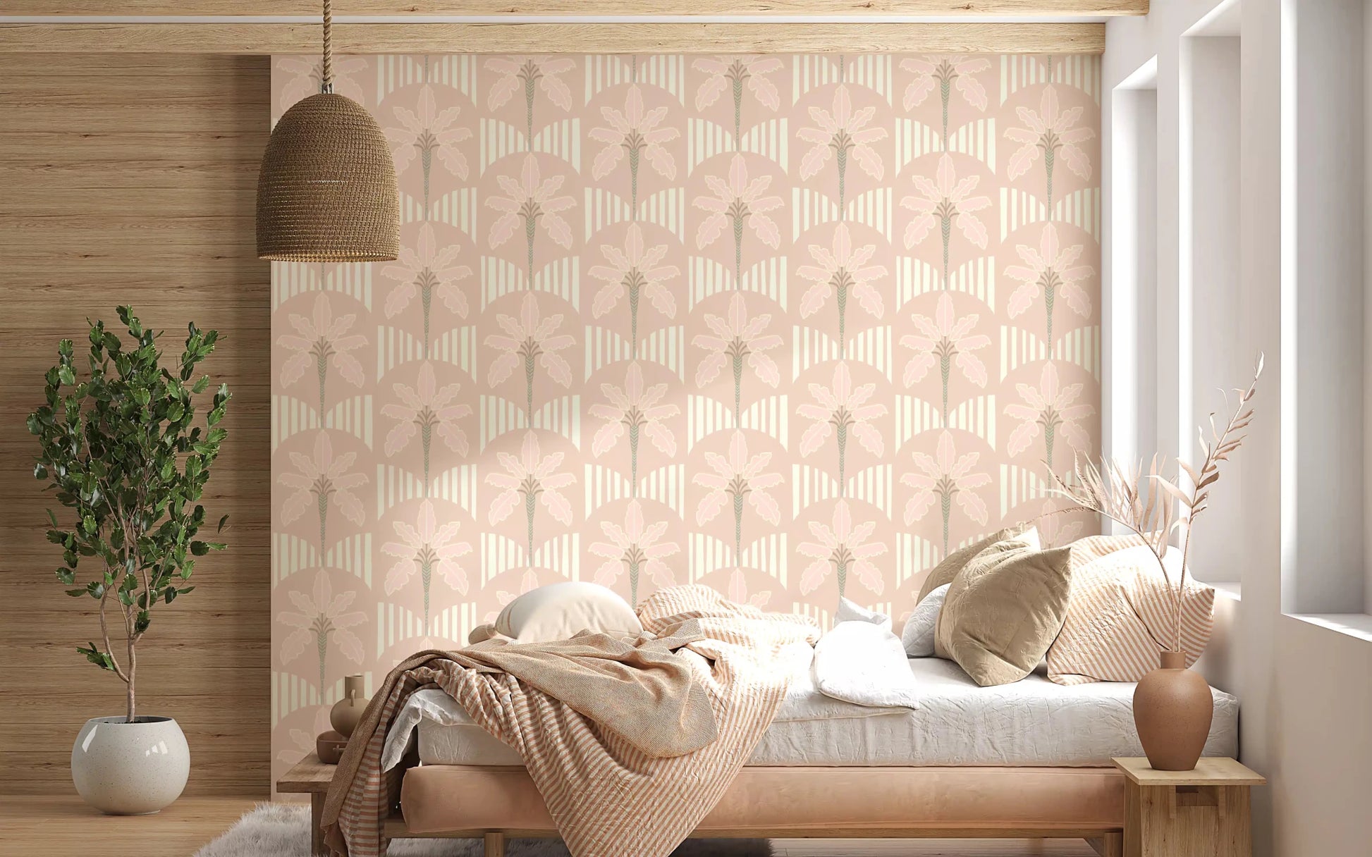 Bedroom area with pastel palm wallpaper and cream stripe detailing in warm tones