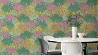 Pastel Tropical Monstera Palm Springs Retro Aqua Wallpaper with Monstera leaves.

