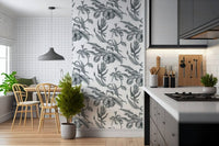 Pe de Maracuja wallpaper mural with sketched passion fruit branches by a bright dining nook beside a gray kitchen