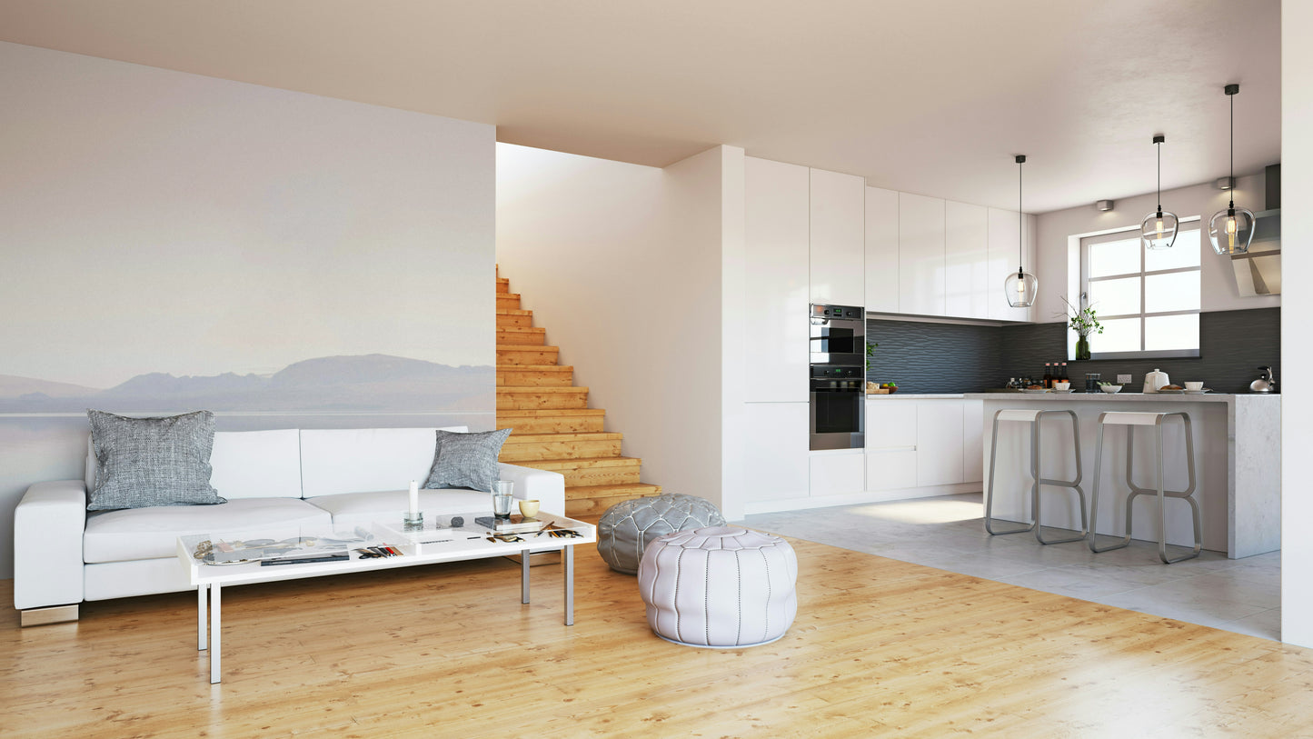 Scenic mountain and lake backdrop for a modern studio or creative workspace.