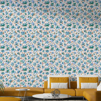 Modern floral wallpaper with peonies on soft blue background

