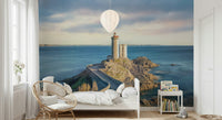 Lighthouse mural on stairwell wall, soft sky colors and shoreline view