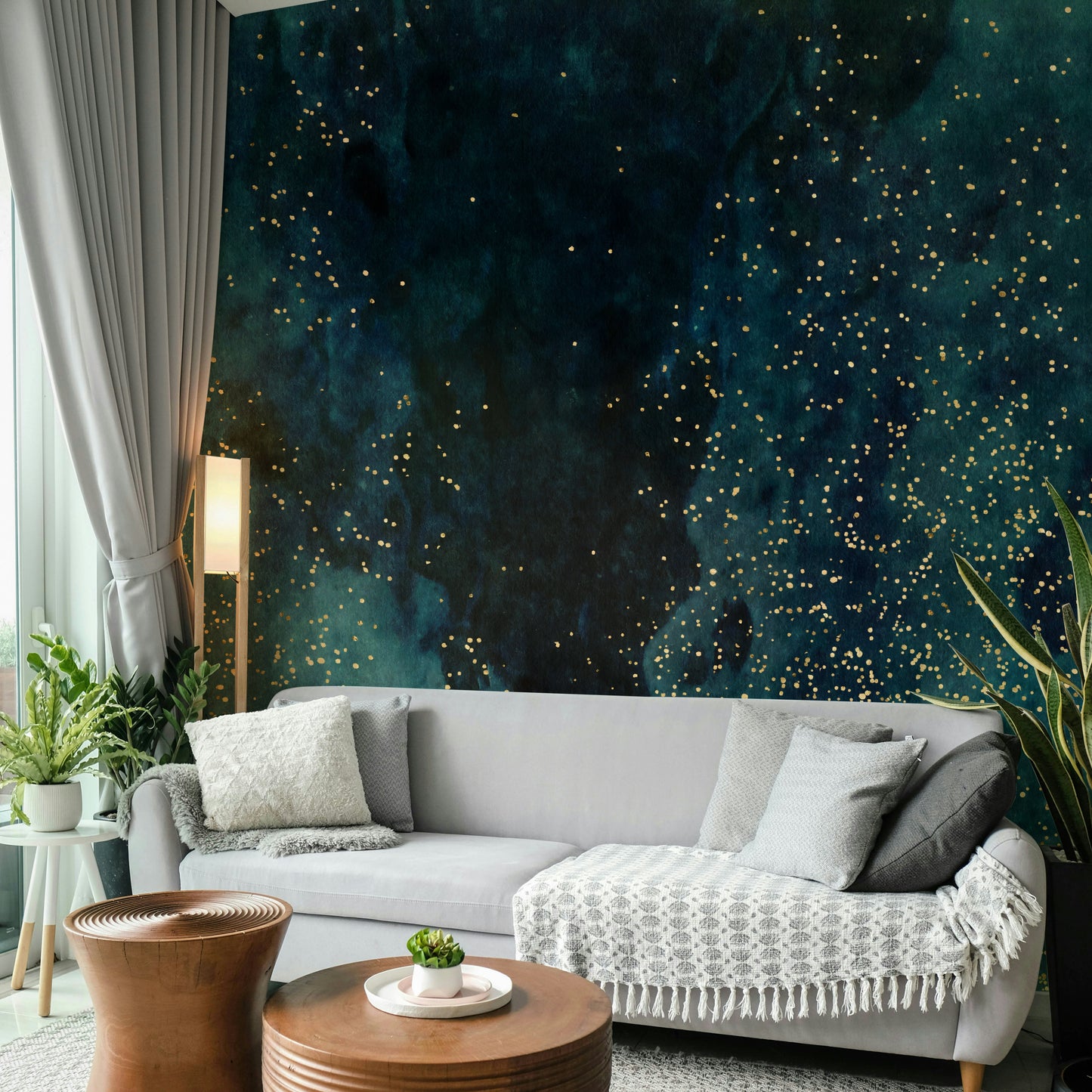 Petrol galaxy mural wallpaper with swirling blue hues and stars.

