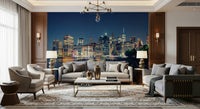Coastal pier mural behind beige sofa, blue water and sky, modern wall decor